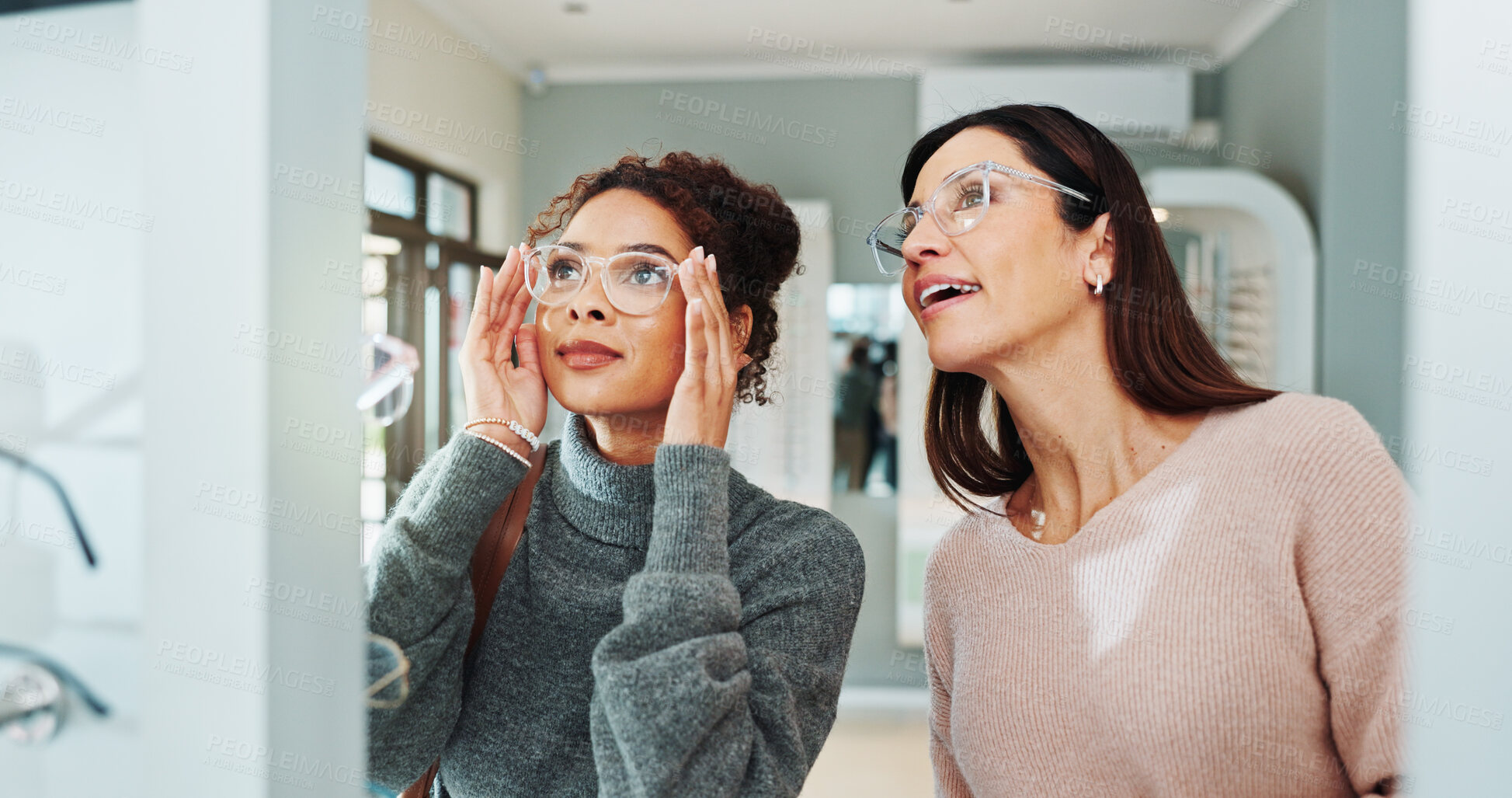 Buy stock photo Optician, woman and shopping glasses with decision for prescription lens, frame fitting and eyewear choice or option. Optometry service, customer and check spectacles for vision correction and size