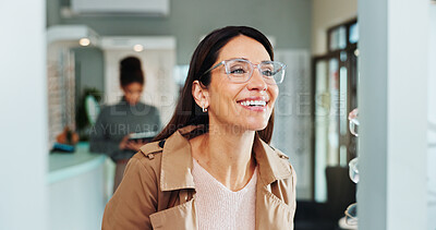 Buy stock photo Client, happy or woman with glasses at optometrist for optometry, eyewear or shopping. Excited customer, smile or checking spectacles frames at optical store for sight, vision or decision at optician
