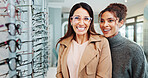 Glasses, smile or vision with customer and optometrist in store for appointment or assessment. Choice, decision or retail with optometry professional and woman in shop for prescription frame lenses