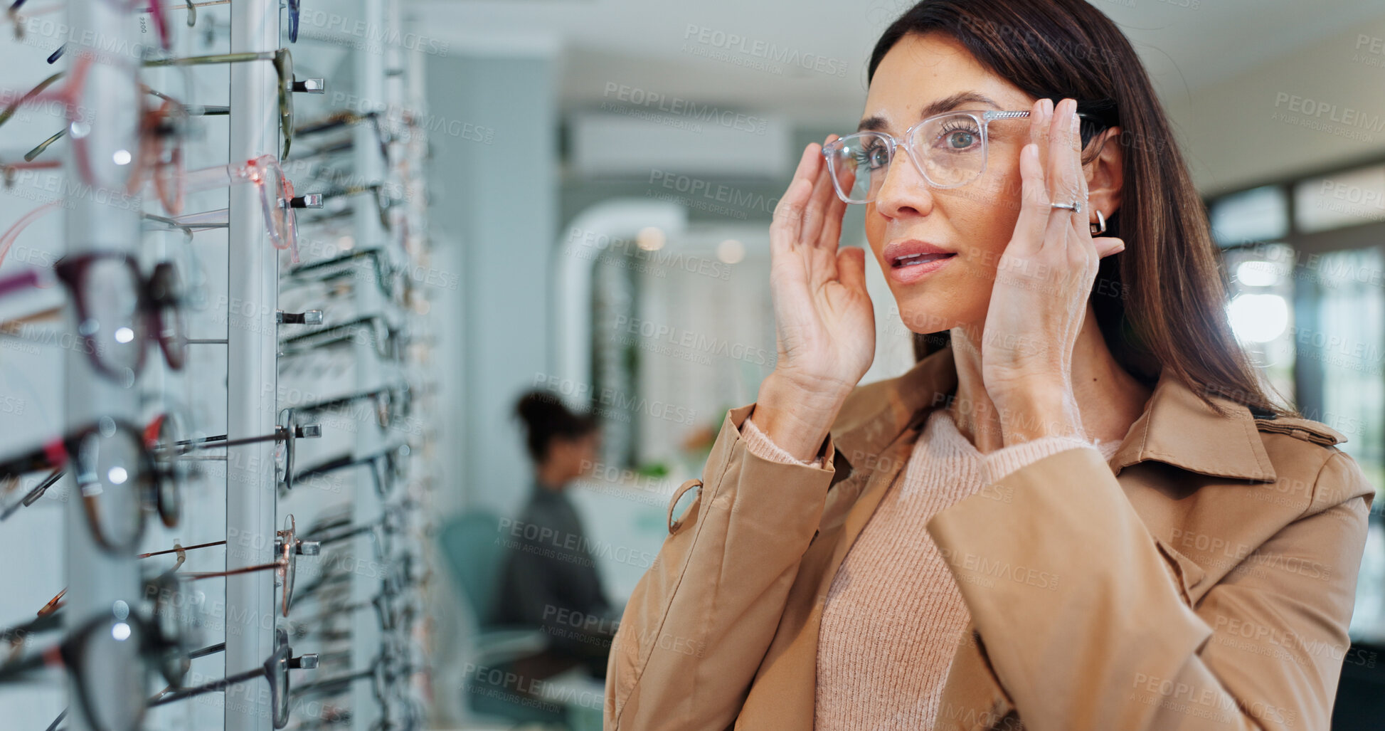 Buy stock photo Eye care, woman and glasses choice in store with frame shopping, prescription eyewear or size fitting. Mature person, healthcare or check spectacles for vision correction, optometry or optical health