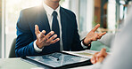 Businessman, hands and meeting with documents for discussion, explanation or proposal at office desk. Closeup, man or accountant talking with paperwork for financial negotiation, deal or work policy