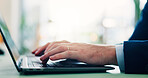 Keyboard, hands and businessman in office typing for research with finance report for planning budget. Laptop, tech and closeup of financial manager with online investment for company in workplace.