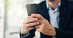 Hands, business and man with phone in office for communication, schedule update and finance research. Person, mobile and reading corporate news, email feedback and financial report of investment chat