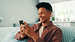 Online dating, phone and man texting in home on social media application and subscription on weekend. Sign up, technology or male person with mobile message on sofa for post, chat and news website