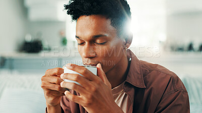 Buy stock photo Break, coffee and relax with man on sofa in living room of home for time off or weekend wellness. Morning, peace and rest with quiet person drinking fresh caffeine beverage from cup in apartment