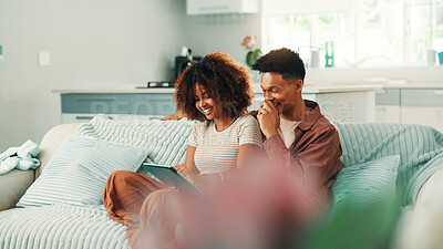 Buy stock photo Couple, tablet and laugh at home with conversation, internet and browsing online. Man, woman and living room sofa for social media, meme or funny post or user video for entertainment in house