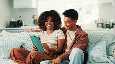 Buy stock photo Tablet, excited and couple on sofa in home with planning romantic vacation, holiday or getaway. Happy, digital technology and man with woman for booking flights for honeymoon trip in apartment.