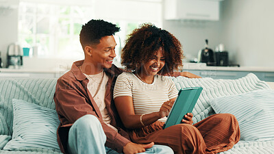 Buy stock photo Tablet, excited and couple on sofa in house with planning romantic vacation, holiday or getaway. Happy, digital technology and man with woman for booking flights for honeymoon trip in apartment.