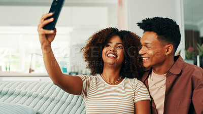 Buy stock photo Love, relax and selfie with couple on sofa in living room of home together for memories. Bonding, photograph and smile with people in apartment for social media or profile picture update on weekend