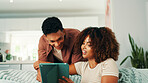 Tablet, couple and happy at home with internet, online ad and browsing marketplace. Man, woman and living room sofa for social media, post or show subscription package for entertainment in house