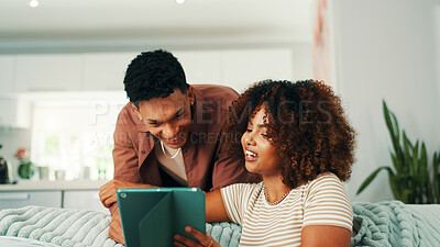 Buy stock photo Tablet, couple and happy at home with internet, online ad and browsing marketplace. Man, woman and living room sofa for social media, post or show subscription package for entertainment in house