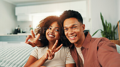 Buy stock photo Face, peace sign and selfie with couple on sofa in home together for memories. Bonding, hugging and love with smile of happy people in apartment for photograph, profile picture or social media