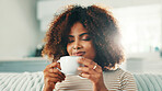 Break, coffee and relax with woman on sofa in living room of home for time off or weekend wellness. Aroma, morning and rest with quiet person drinking fresh caffeine beverage from cup in apartment