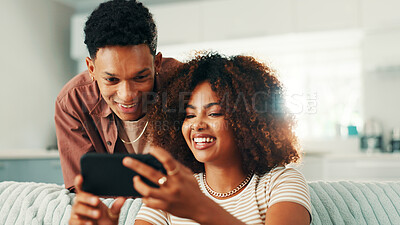 Buy stock photo Phone, couple and funny laugh at home with internet, online joke and browsing for meme. Man, woman and living room sofa for social media post, comedy or sharing video for entertainment in house