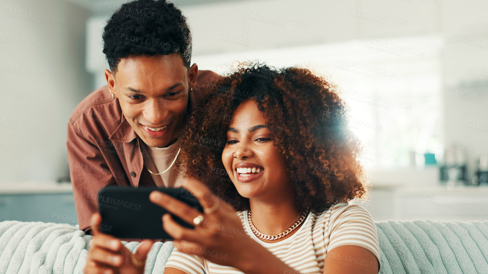 Buy stock photo Phone, couple and funny laugh at home with internet, online joke and browsing for meme. Man, woman and living room sofa for social media post, comedy or sharing video for entertainment in house