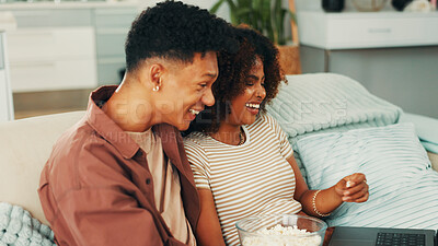 Buy stock photo Happy couple, laptop or popcorn for laughing in home for romance, love and bonding together. Funny comedy, joke humor or man on sofa with woman or smile for streaming film, subscription or series