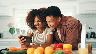 Buy stock photo Phone, happy couple and cooking in kitchen with vegetables, organic tutorial and healthy diet. Food, man and woman on mobile with recipe blog, online guide and watch video for vegan nutrition in home
