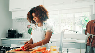 Buy stock photo Kitchen, cooking and woman on chopping board with vegetables, meal prep and nutrition. Happy person, knife and cut pepper for organic diet, wellness and vegan ingredients for food in home with couple