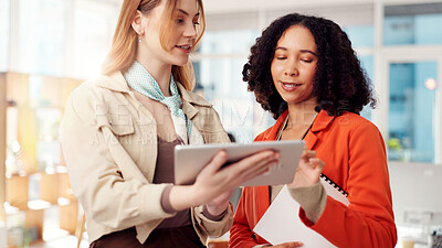 Buy stock photo Business people, tablet and women in office, discussion and internet with sales agency. Happy employees, conversation or ad consultant in workplace, tech and email with positive review, advice or app