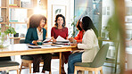 Women, meeting and document with group for planning, brainstorming or review for problem solving at startup. Business people, paperwork and team with report, proposal and feedback at creative agency