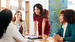 Meeting, business and women talk in office for planning, ideas and feedback of magazine proposal. Manager, people and editorial team with discussion, brainstorming and schedule for journalism report