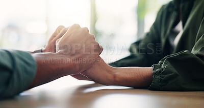 Buy stock photo Care, comfort and couple holding hands on table for love, loyalty and connection in home. Support, kindness and people closeup for empathy, forgive partner and commitment for relationship together
