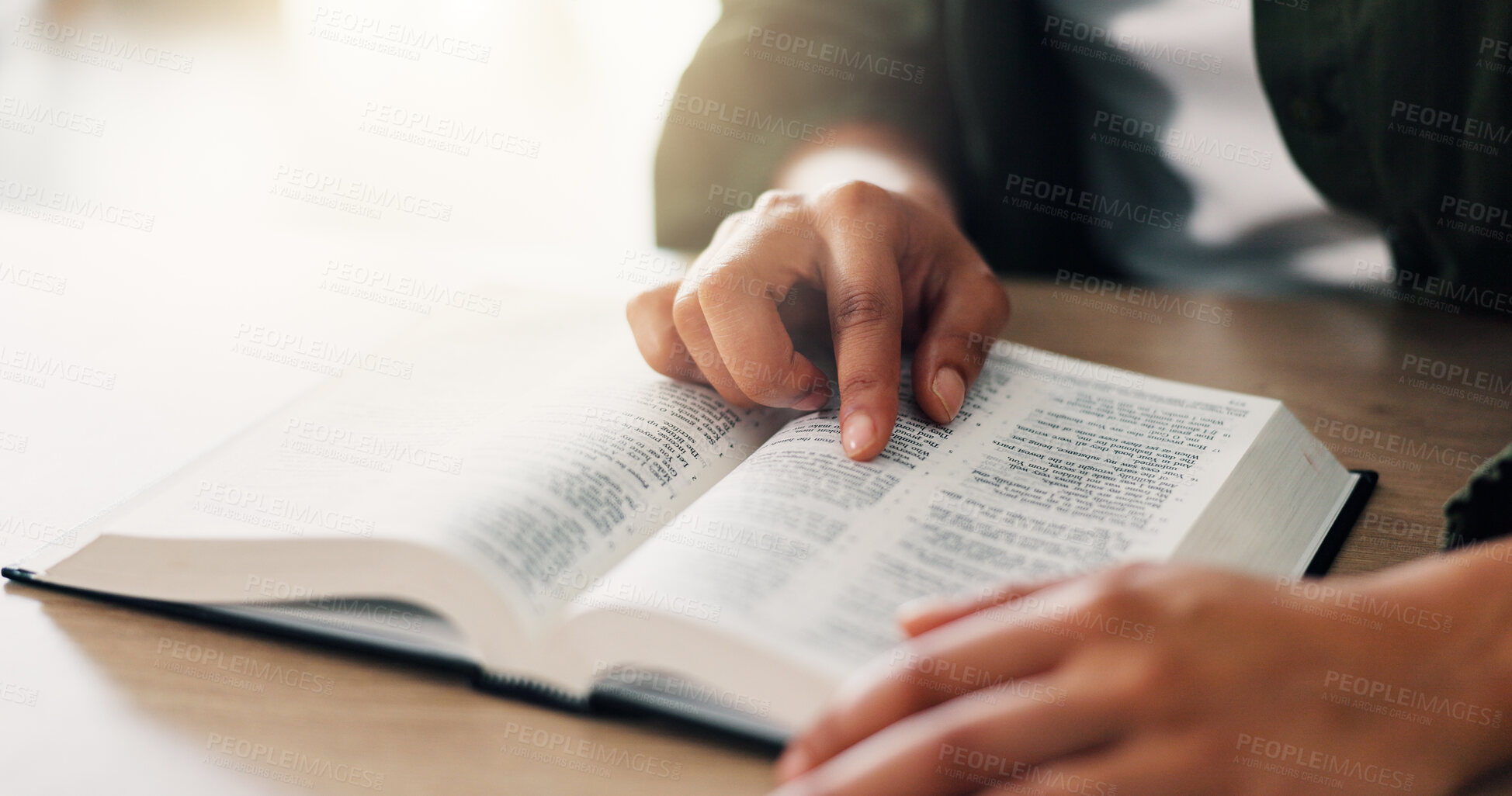 Buy stock photo Bible, hands and person reading book with faith in spiritual religion for peace, guidance or learning. Jesus Christ, house or worship with praise, scripture and gratitude with prayer, story or gospel