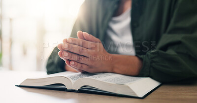Buy stock photo Bible, prayer hands and person reading book in spiritual religion for peace, guidance or learning. Jesus Christ, house or holy worship with praise, scripture and gratitude for God, faith or gospel 