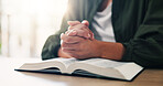 Bible, hands and person praying with book in spiritual religion for peace, guidance or learning. Jesus Christ, house or holy worship with praise, scripture and gratitude for God, faith or gospel 