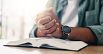 Home, hands and person praying with bible in spiritual religion for peace, guidance and learning. Jesus Christ, book or holy worship with praise, scripture and gratitude for God, faith and gospel