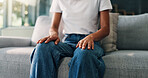Hands, nervous and therapy with person on sofa in ptsd or trauma counseling session closeup. Anxiety, psychology and stress with patient at consulting appointment in clinic for grief, loss or pain