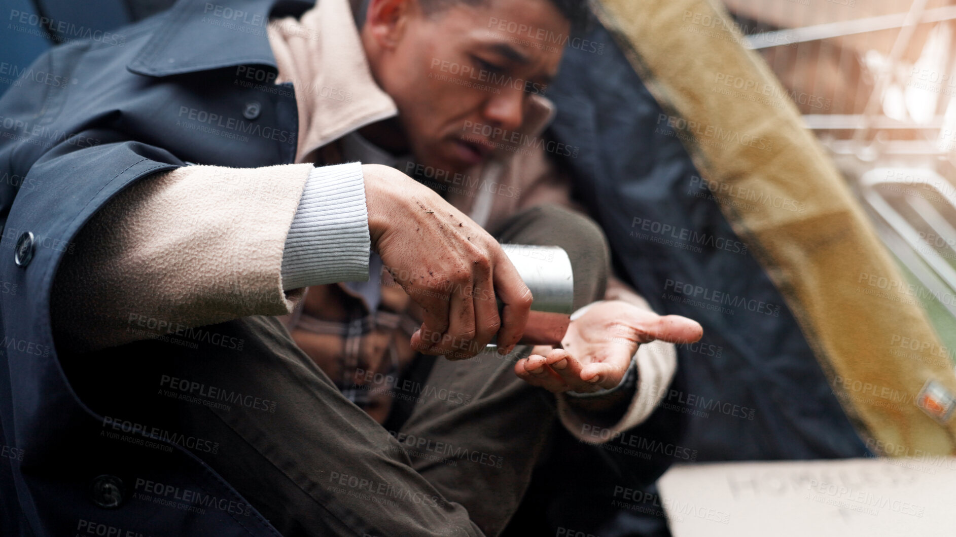 Buy stock photo Homeless, poverty and cup with money and man in park for charity, unemployment rate and crisis. Mental health, refugee and welfare aid with male beggar and tent for tired, poor and  donation