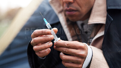 Buy stock photo Hands, poverty and homeless with needle, drugs and tent with addiction, injection and substance abuse at park. Person, syringe and narcotics with grief, bankrupt and outdoor with illegal medicine