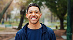 Happy, fitness and portrait of man in nature with confidence for running with marathon training. Sports, smile and male athlete with pride for cardio workout or exercise outdoor in park for activity.