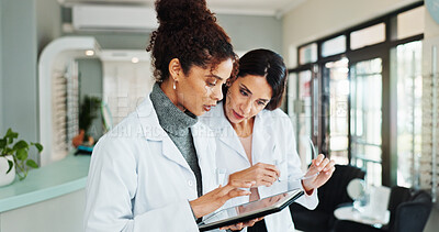 Buy stock photo Tablet, women and optician in store for vision discussion, planning treatment or eyesight test results. Digital technology, optometrist and ophthalmology with glasses for eye health with medical team