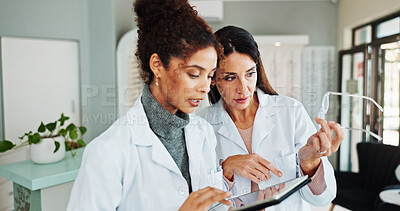 Buy stock photo Tablet, women and optician with glasses for vision discussion or planning. Digital technology, optometrist and store for eyesight test results, collaboration and medical team with lens for eye health