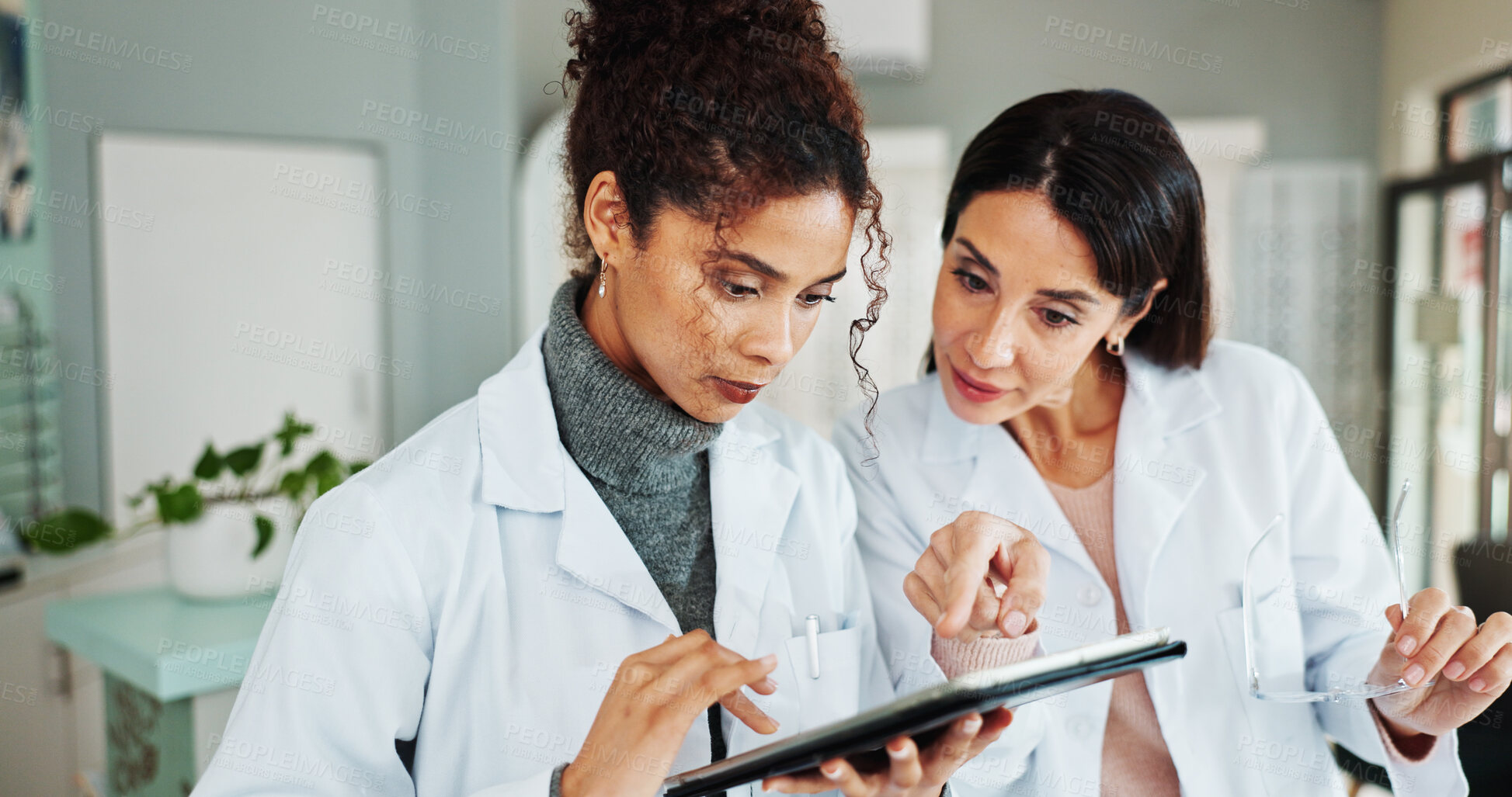 Buy stock photo Tablet, women and optician with eye health, vision discussion, planning treatment. Digital technology, optometrist and store for eyesight test results, collaboration and medical team with glasses