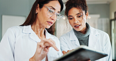 Buy stock photo Tablet, women and ophthalmologist in clinic for vision discussion, planning treatment or eyesight test results. Digital technology, optometrist and store for eye health, collaboration or medical team