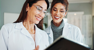 Buy stock photo Tablet, women and ophthalmologist in clinic for eye care discussion, planning and show eyesight test results. Digital technology, optometrist and store for health, collaboration or happy medical team