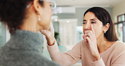 Buy stock photo Glasses, eye exam and help with women at optometrist for astigmatism, vision and consulting. Healthcare, ophthalmologist and optical frame with people in clinic for patient care and medical lens