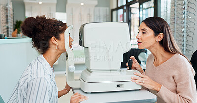 Buy stock photo Optometrist, women and vision test with autorefractor for health, eye wellness and eyesight correction in store. Check patient, machine and medical ophthalmologist in exam for glasses prescription