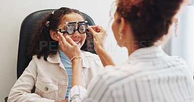 Buy stock photo Eye test, optometry or woman with glasses or child in clinic with diagnostic tool for prescription lens. Ophthalmology, exam or optometrist in vision assessment with kid, trial or medical equipment