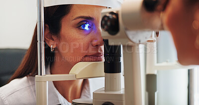 Buy stock photo Eye test, optometry or optician with woman in clinic with diagnostic tool for prescription lens. Ophthalmology, laser or optometrist in vision assessment with person, machine or medical equipment