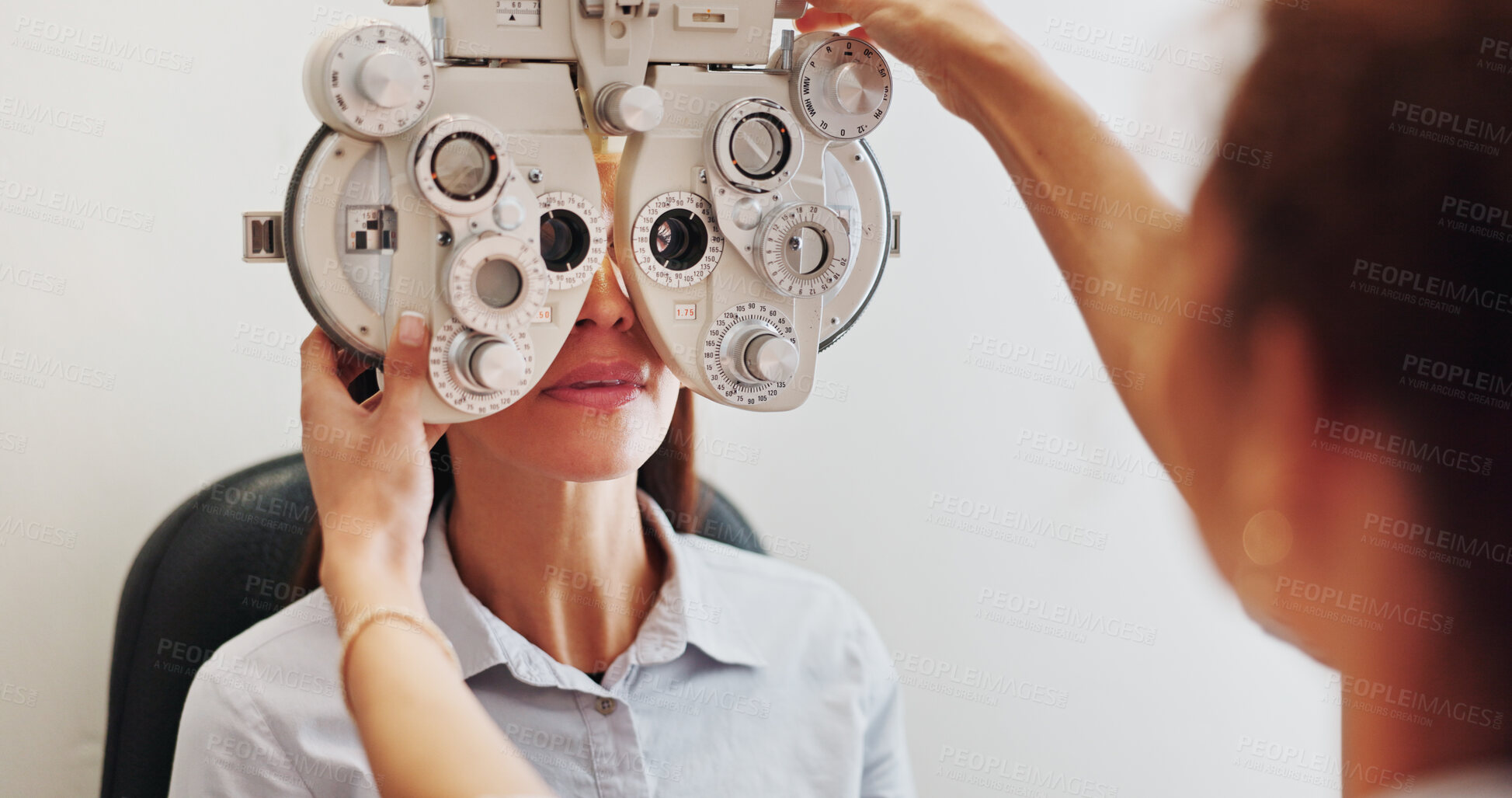 Buy stock photo Eye exam, optometry and optician with woman in clinic with phoropter for prescription lens. Ophthalmology, healthcare and optometrist with female patient for vision assessment with machine in store.