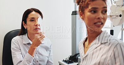 Buy stock photo Eye test, cover or optician with woman in clinic with diagnostic tool for prescription lens. Ophthalmology, depth perception or optometrist in vision assessment with person, spoon or visual check