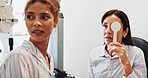 Eye test, cover or optometry with woman in clinic with diagnostic tool for prescription lens. Optician, depth perception or optometrist in vision assessment with person, correction or visual check