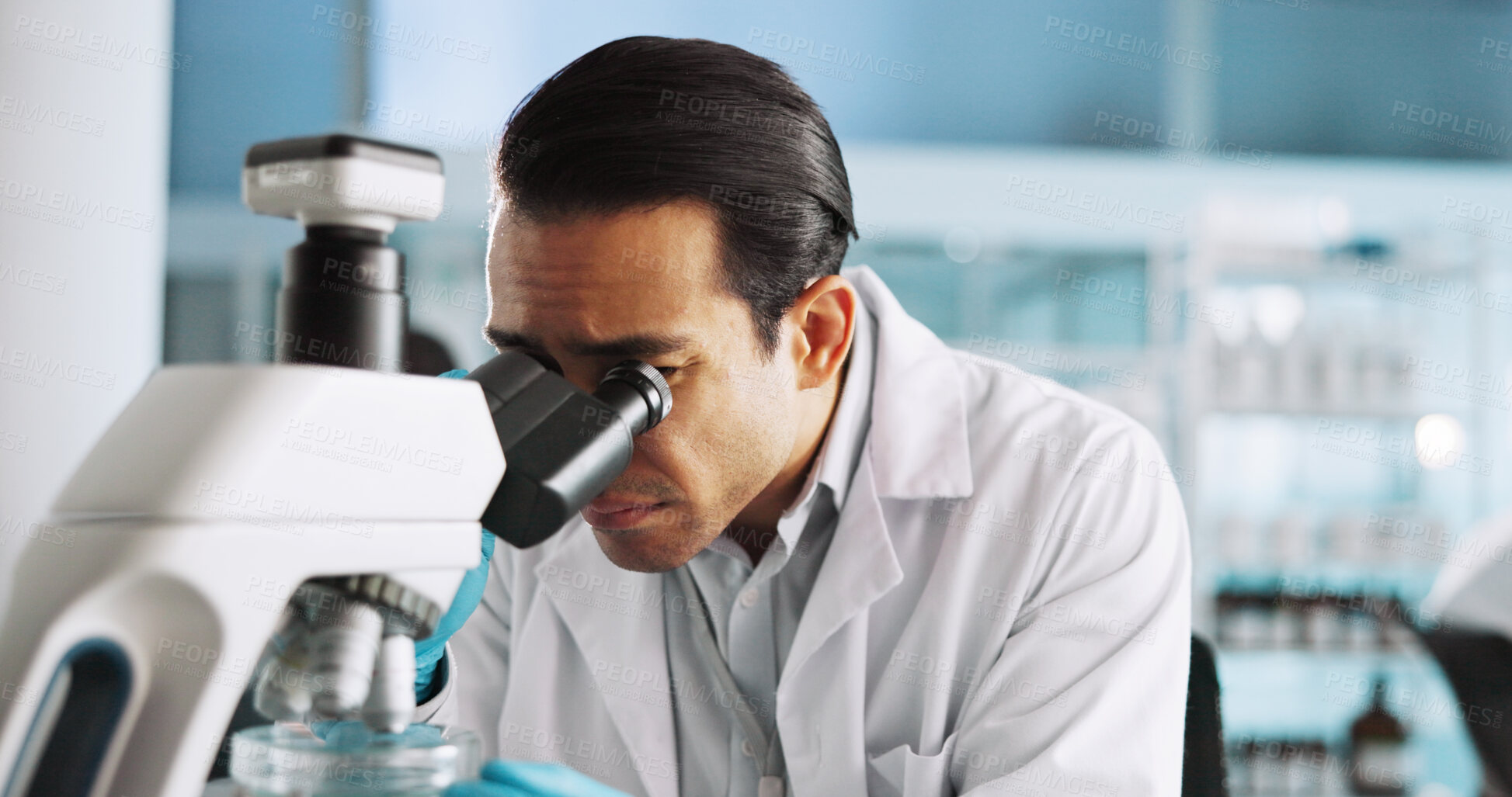 Buy stock photo Microscope, research and science with man in laboratory for healthcare, medical or pharmaceutical innovation. DNA, sample and study with scientist in clinical trial for breakthrough or development