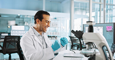 Buy stock photo Scientist, man and microscope with celebration for biology, breakthrough or medical research funding. Biotech, laboratory and excited with DNA study for pharmaceutical RNA or pathology experiment