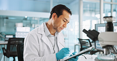 Buy stock photo Scientist, man and tablet with study report for biology, breakthrough or medical research. Biotech, laboratory and thinking with DNA microscope analysis for pharmaceutical RNA or pathology experiment