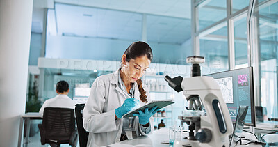 Buy stock photo Scientist, woman and tablet with research for biology, innovation or medical notes analysis. Biotech, laboratory and microscope with DNA study for pharmaceutical RNA or pathology experiment project